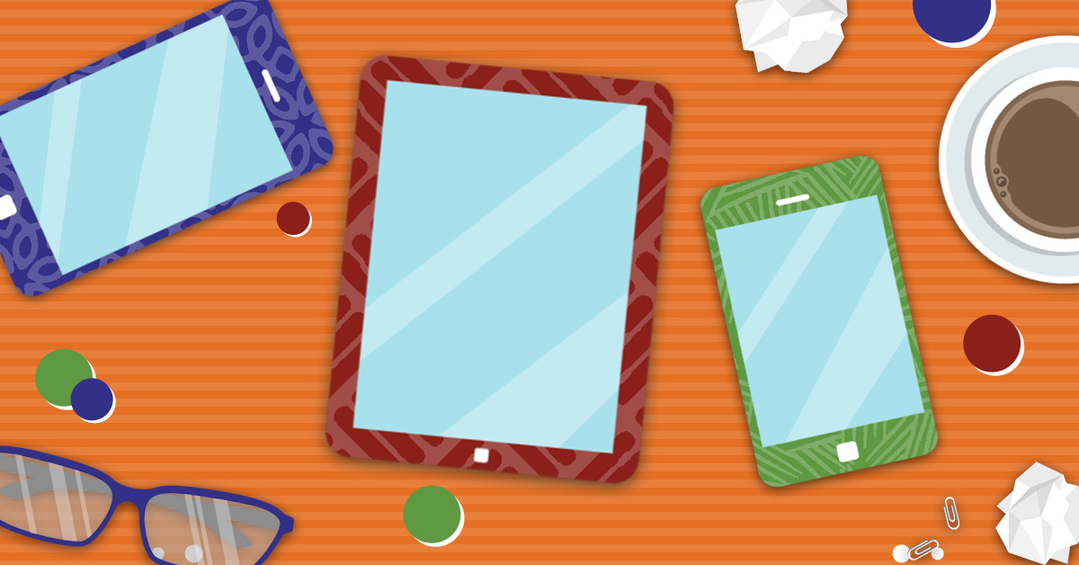 mobile devices on colorful desk backing