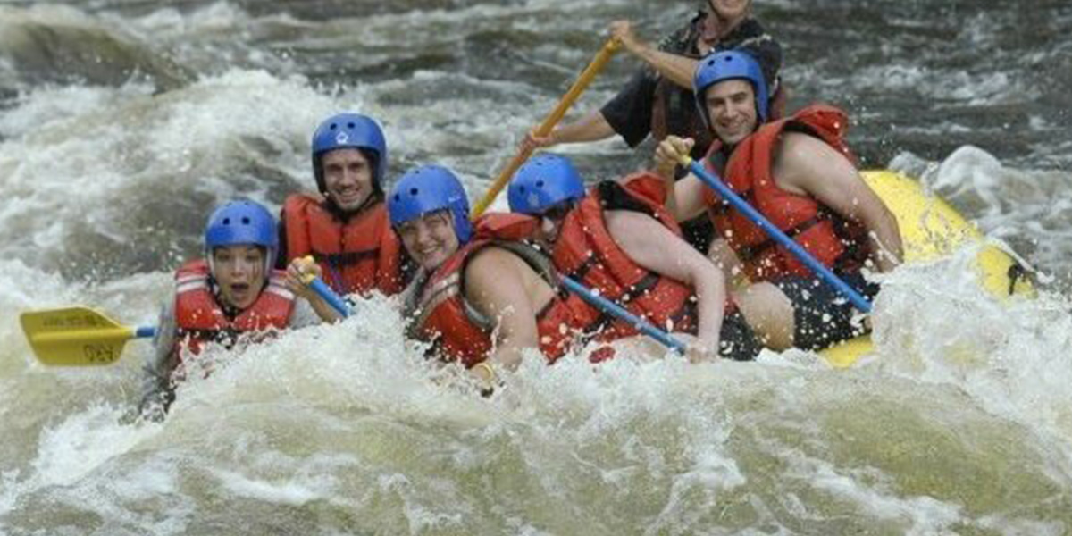 Shira Boyle whitewater rafting during travels