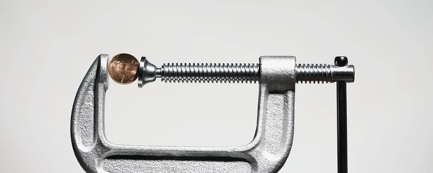 Penny fastened to c-clamp